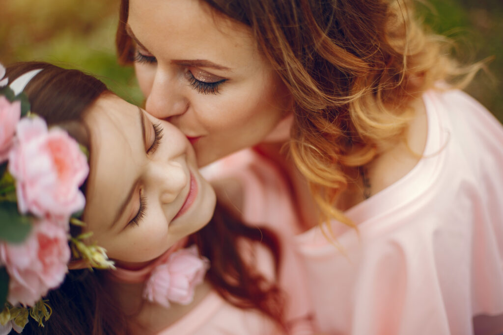 child with mom on Mother's Day 2024